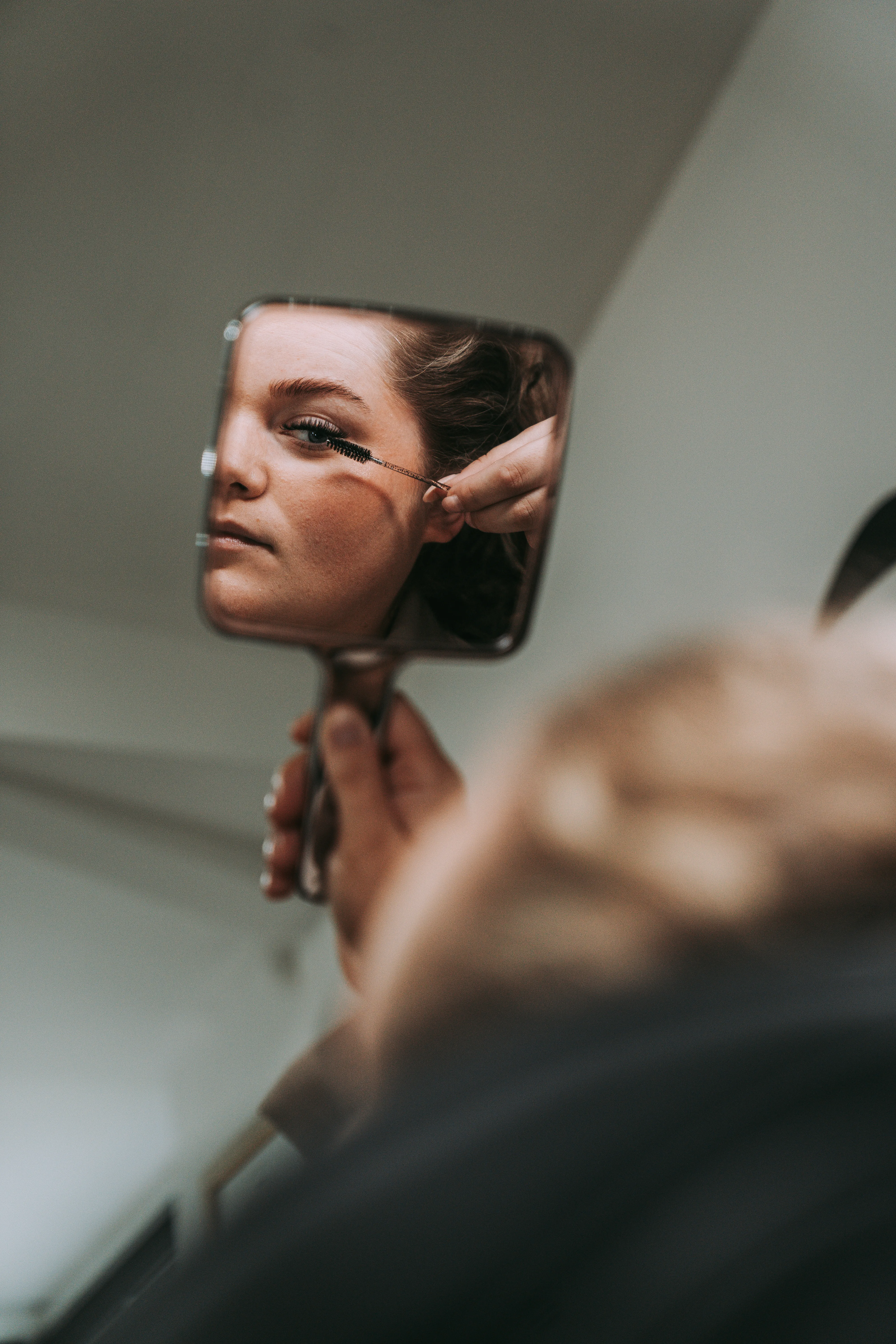 Bride getting ready, mirror reflection
