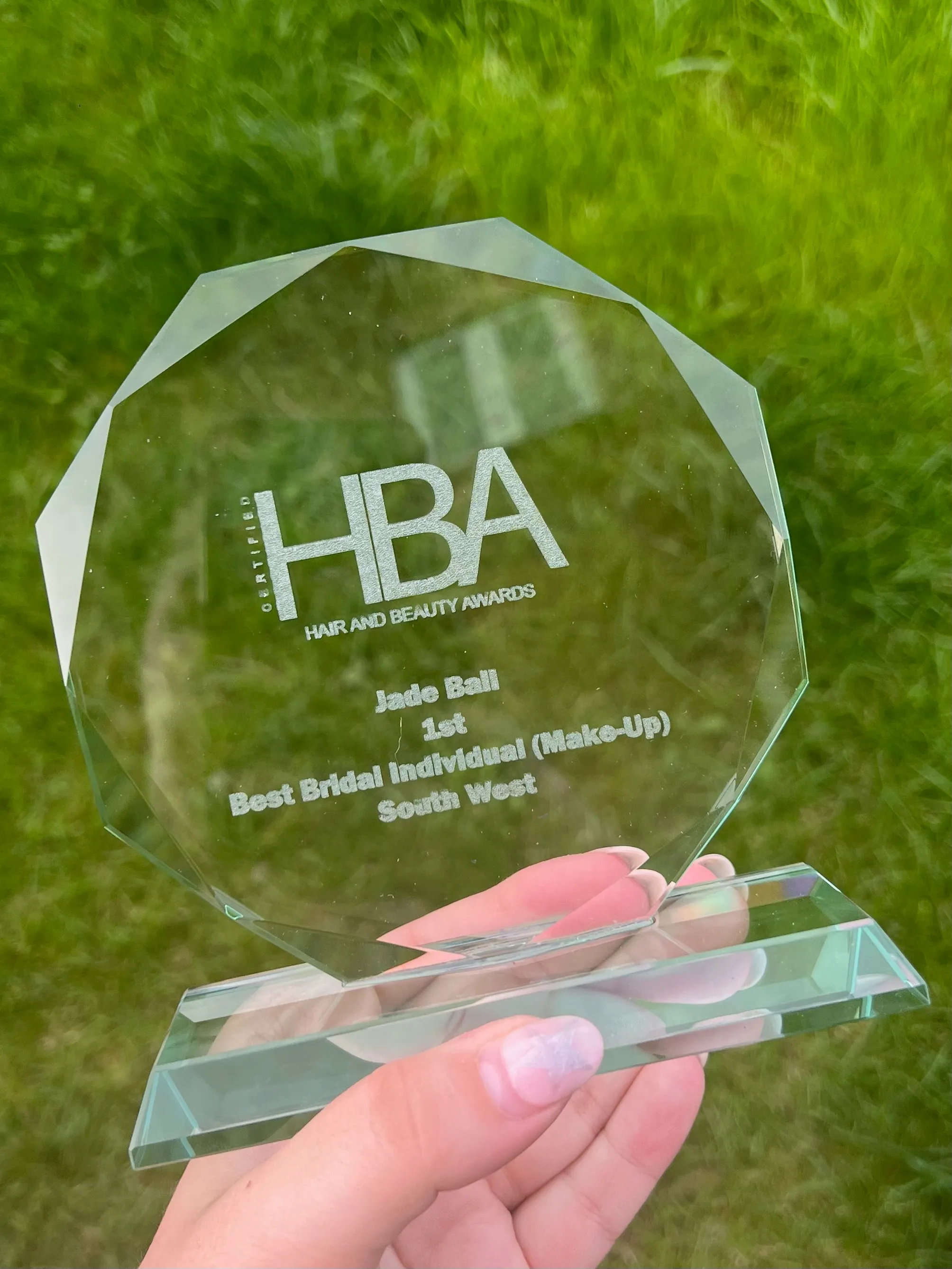 Jade holding her HBA 2023 first place trophy